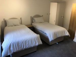 Uma cama ou camas num quarto em City centre park lane apartment