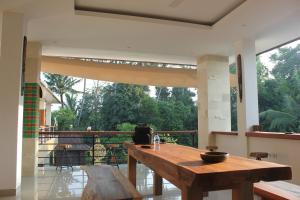 Balkón nebo terasa v ubytování Indah Bali Guesthouse