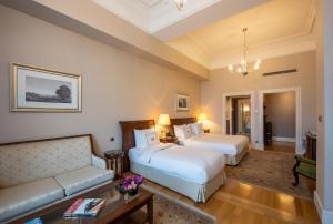 Postel nebo postele na pokoji v ubytování Pera Palace Hotel