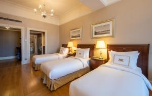 Postel nebo postele na pokoji v ubytování Pera Palace Hotel