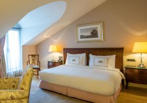Postel nebo postele na pokoji v ubytování Pera Palace Hotel