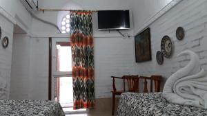 Fotografie z fotogalerie ubytování Caravan Sarai Yotoqxona v destinaci Chiva + 30 fotografií