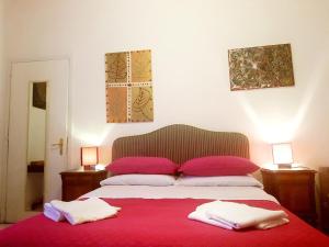 Postel nebo postele na pokoji v ubytování B&B Platamon