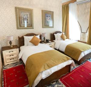 Кровать или кровати в номере kyrenia palace boutique hotel