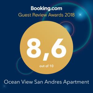 un cartel que lee Quest Review premia al Ocean View San Antilles apartments en Ocean View San Andres Apartment, en San Andrés