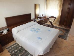 A bed or beds in a room at La Casa di Lisa a 20 km dal mare