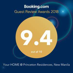 a sign that reads guest review awards with a yellow circle at Your HOME @ Princeton Residences, New Manila in Manila