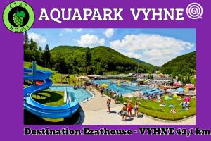 a water park with a slide at a water park at Ezathouse Devičie in Krupina