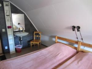 Postel nebo postele na pokoji v ubytování Håverud Hostel