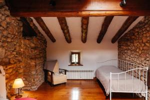Posteľ alebo postele v izbe v ubytovaní Cal Pesolet Eco Turisme Rural