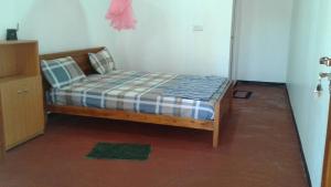 Letto o letti in una camera di Sai Seashell Rest Inn Nilaveli