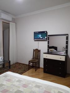 TV a/nebo společenská místnost v ubytování Guesthouse Zeinabi