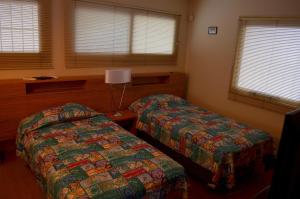 Ένα ή περισσότερα κρεβάτια σε δωμάτιο στο Vía Lavalle Suites 1