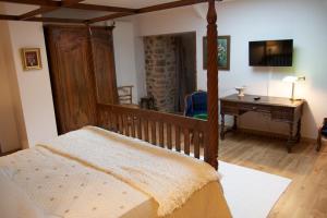Postel nebo postele na pokoji v ubytování Relais Saint Aubin