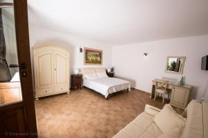 Postel nebo postele na pokoji v ubytování La Collina Degli Ulivi