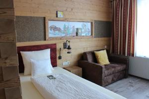 Posteľ alebo postele v izbe v ubytovaní Märchenhotel 3 Sterne Superior Waldpension Nebelstein