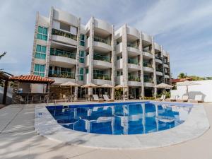 Bazén v ubytování Wave Suítes Hotel & Lounge bar nebo v jeho okolí