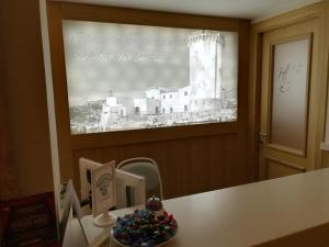 TV a/nebo společenská místnost v ubytování Hotel Del Golfo