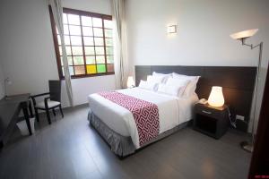 Ένα ή περισσότερα κρεβάτια σε δωμάτιο στο Hotel Union