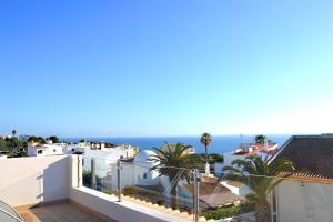 - une vue sur l'océan depuis le balcon d'une maison dans l'établissement Villa Barros by GalanteVasques, à Carvoeiro