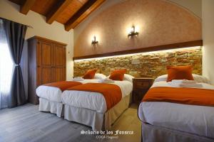 
Cama o camas de una habitación en Señorío de los Fonseca
