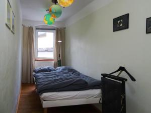 A bed or beds in a room at Apartment Center