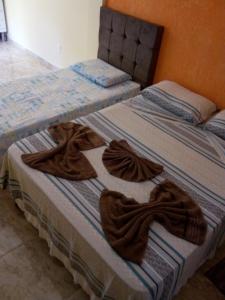 Postel nebo postele na pokoji v ubytování Chalés Pousada Serra Negra