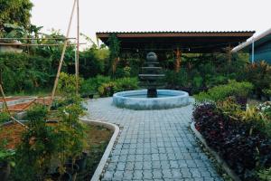 Ein Garten an der Unterkunft Le Pes Villas