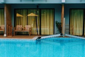 Der Swimmingpool an oder in der Nähe von Le Pes Villas