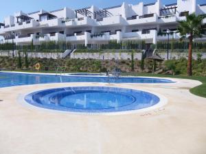 Bazén v ubytovaní Apartment Aguacate alebo v jeho blízkosti