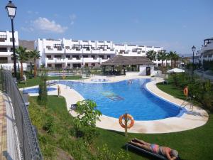 Bazén v ubytovaní Apartment Aguacate alebo v jeho blízkosti