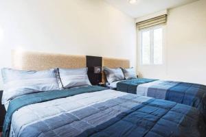 Postel nebo postele na pokoji v ubytování Blue Lagoon Hua Hin - Sea Renity Villa
