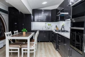 Köök või kööginurk majutusasutuses Loft Modern Premium
