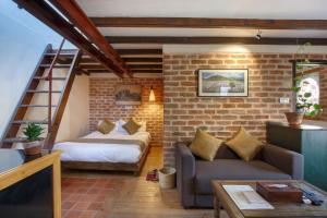 Postel nebo postele na pokoji v ubytování Thamel Villa Heritage Hotel