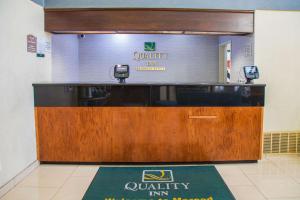 a view of a cashier counter at a quality inc store at Quality Inn Merced Gateway to Yosemite in Merced