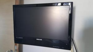 A television and/or entertainment centre at Hotel Canasta