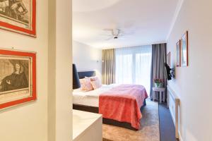 Postel nebo postele na pokoji v ubytování Hotel Admiral