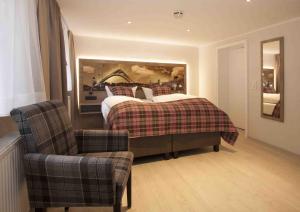 Ein Bett oder Betten in einem Zimmer der Unterkunft Hotel Nuhnetal