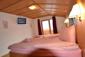 Postel nebo postele na pokoji v ubytování Ferienhaus Rieder