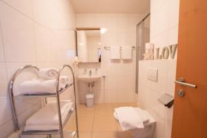 Kúpeľňa v ubytovaní Sonnseitn Appartements + 37 fotografií