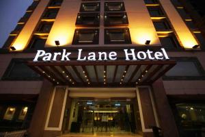 a park lane hotel sign on the front of a building at Park Lane Hotel Lahore in Lahore