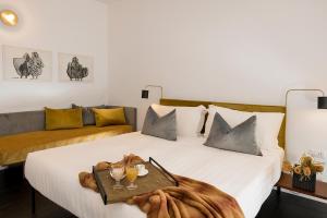 Postel nebo postele na pokoji v ubytování Maison Ottavia