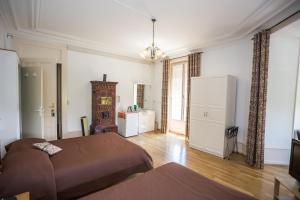 Cama o camas de una habitación en Hotel des Tourelles