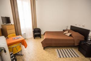 Cama o camas de una habitación en Hotel des Tourelles