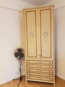 a closet with a dresser in a room at La casa di "Bella" in Milazzo