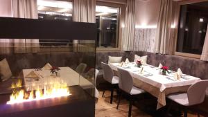 Ein Sitzbereich in der Unterkunft Hotel Bergkranz