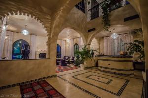 a lobby of a house with a large room at Lina Ryad & Spa in Chefchaouene