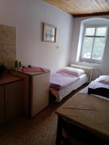 Posteľ alebo postele v izbe v ubytovaní Chata Pepino