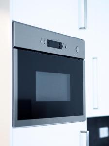 Kuchyň nebo kuchyňský kout v ubytování Apartmány Mia Valtice