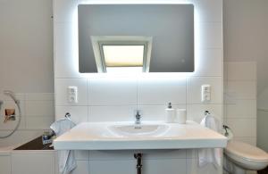 Et badeværelse på Moselhof Ferienwohnungen + 19 billeder